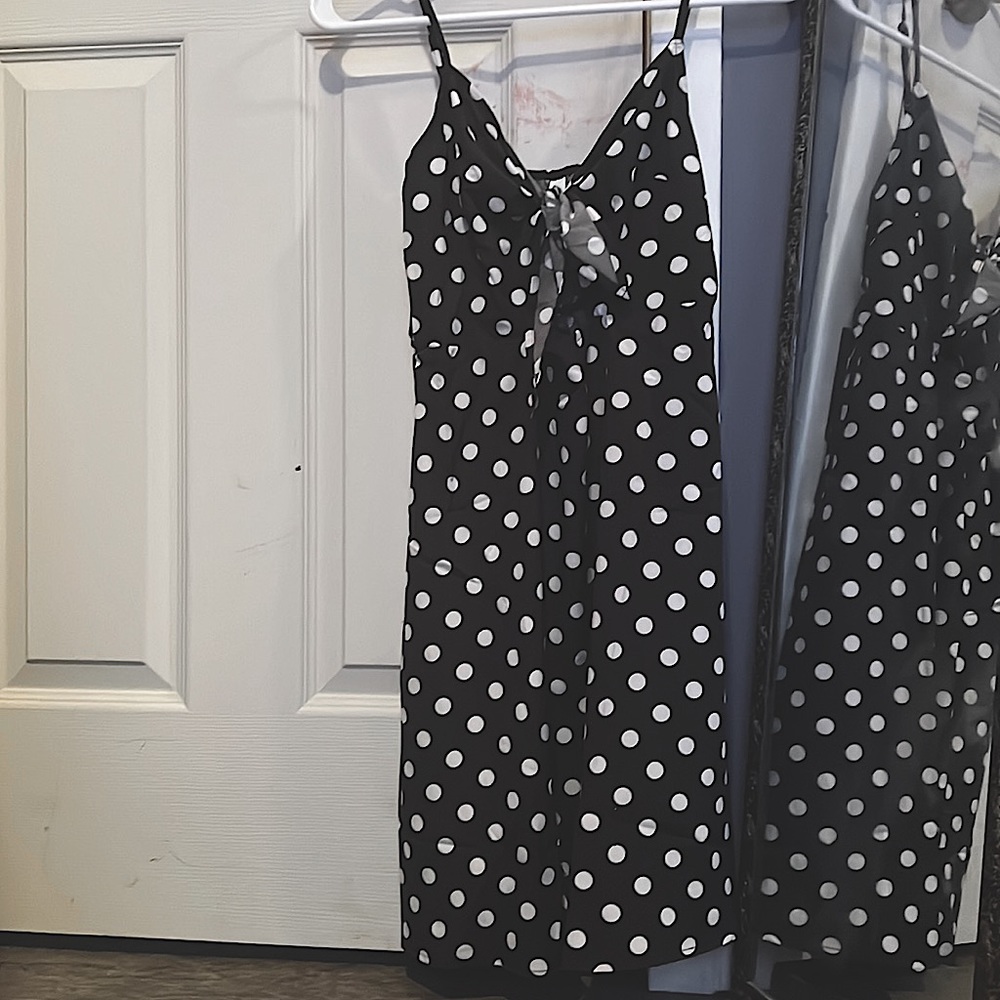 I am selling a cute dress from urban concepts has adjustable straps It don’t fit